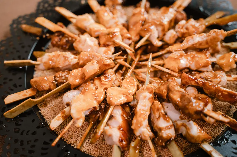 Glazed skewers from the Hierros España cocktail at the Cocheras del Puerto, Huelva