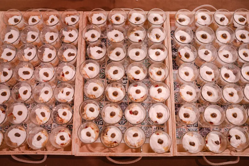 Individual glasses in wooden boxes prepared for the Hierros España cocktail